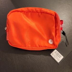 Pure Barre red crossbody bag